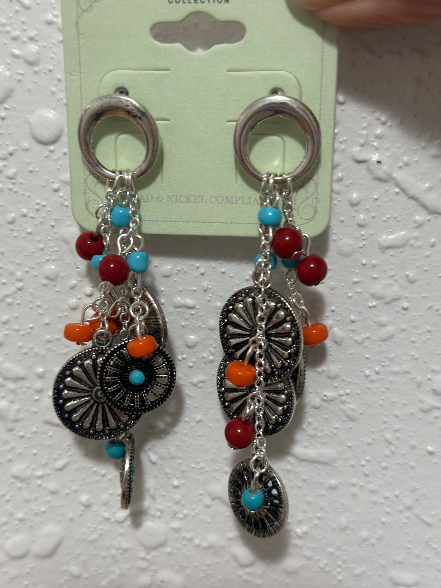 Silver pin wheel earrings