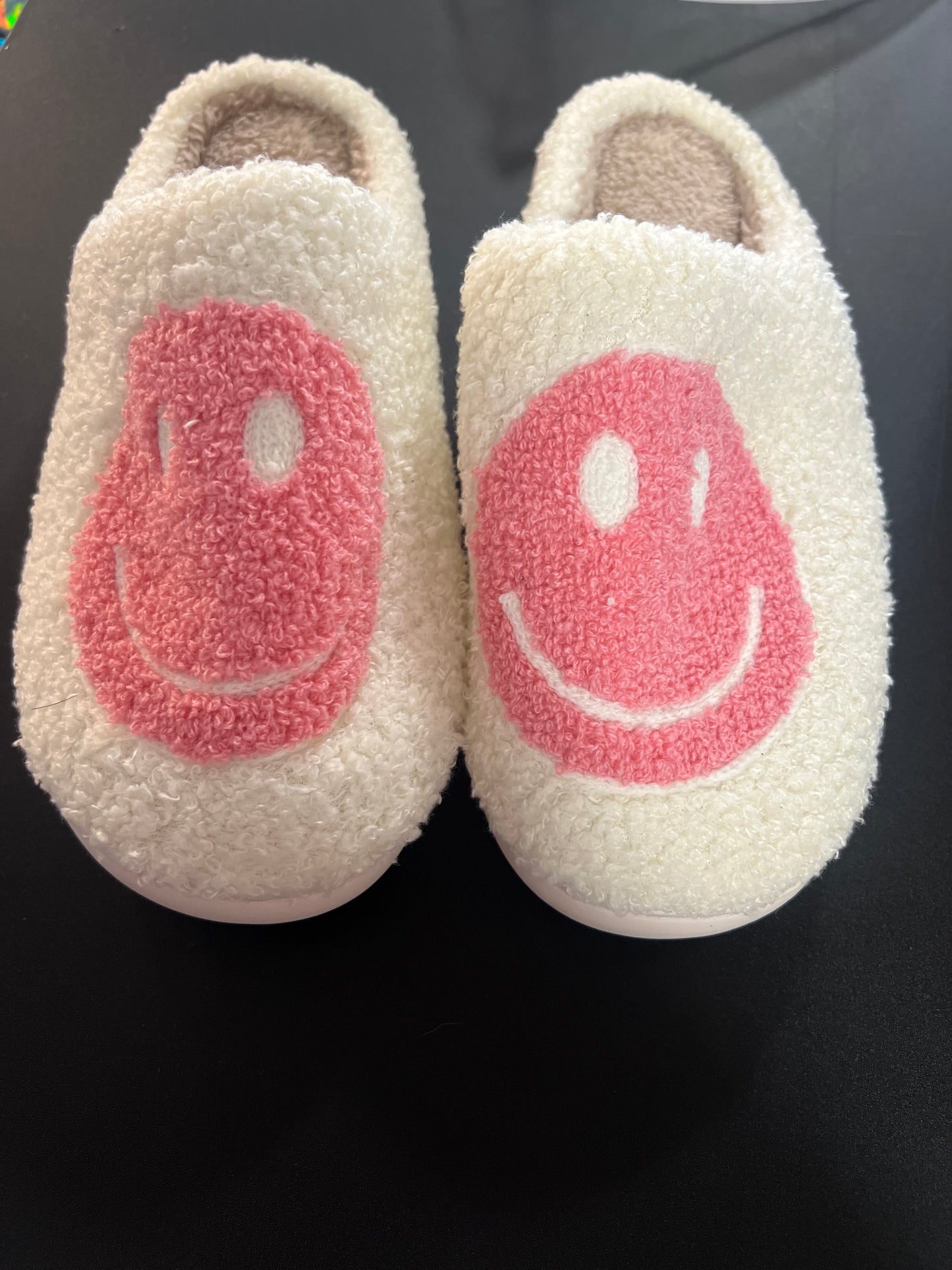 pink smiley slippers