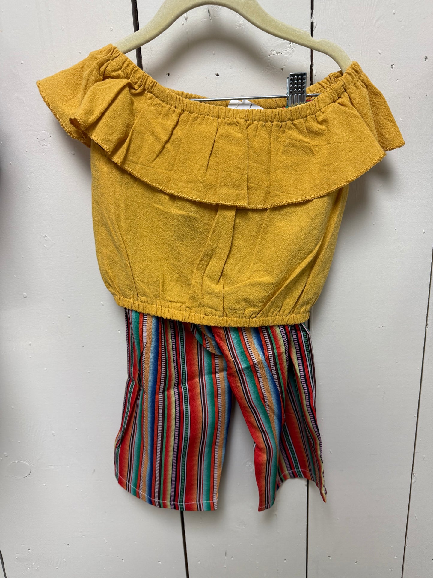 yellow shirt w serape pants