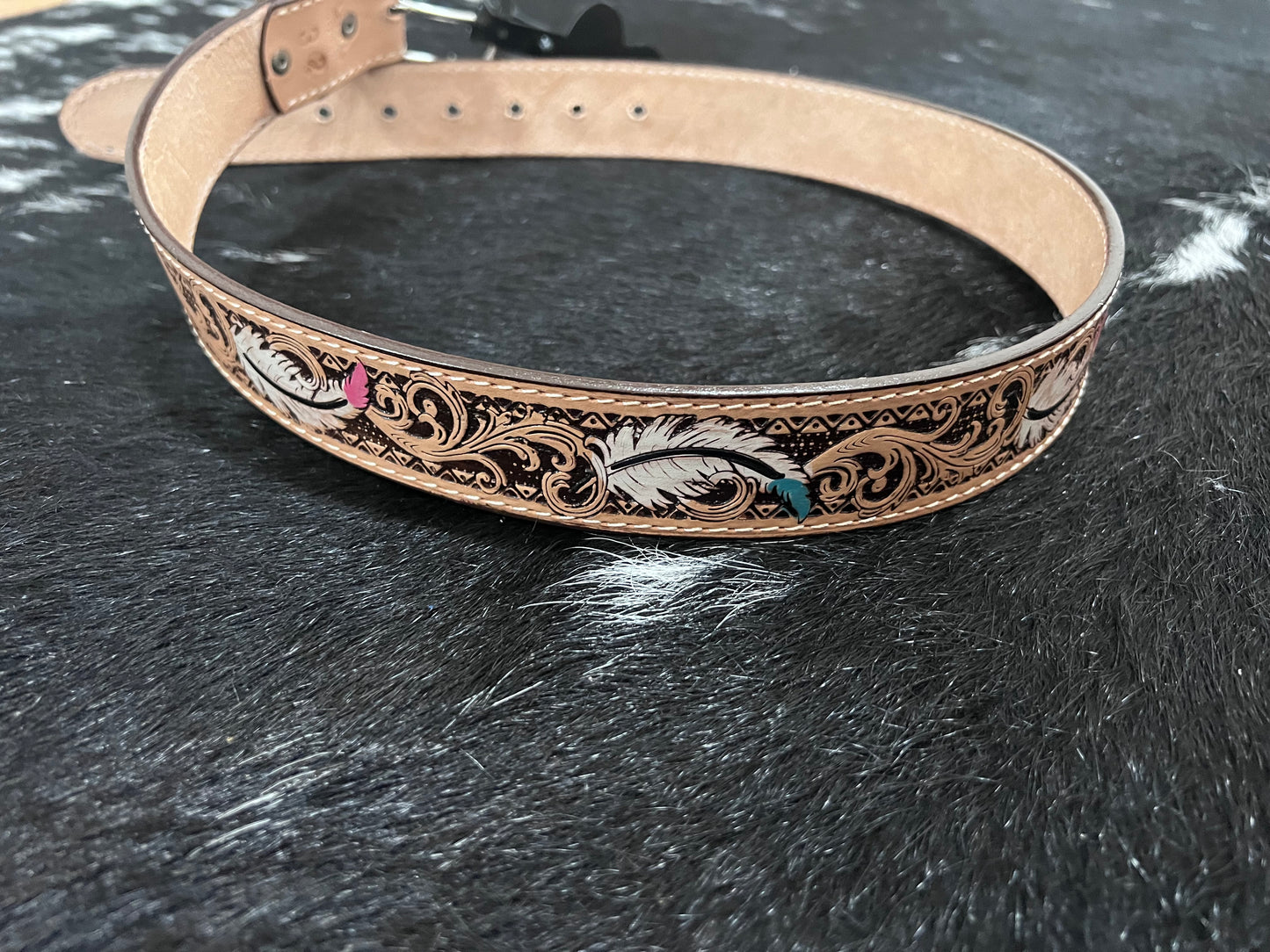 feather tooled belt